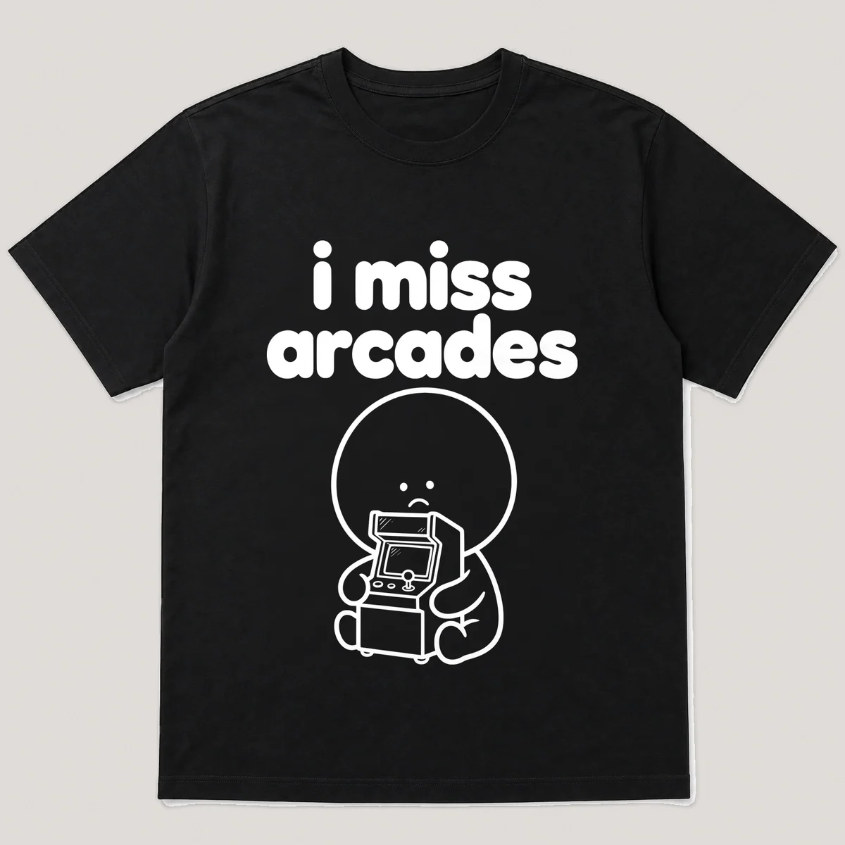 lonely boi tee: a small sad cartoon boy hugging a glowing arcade cabinet with a joystick, with the words i miss arcades above him, Black front view