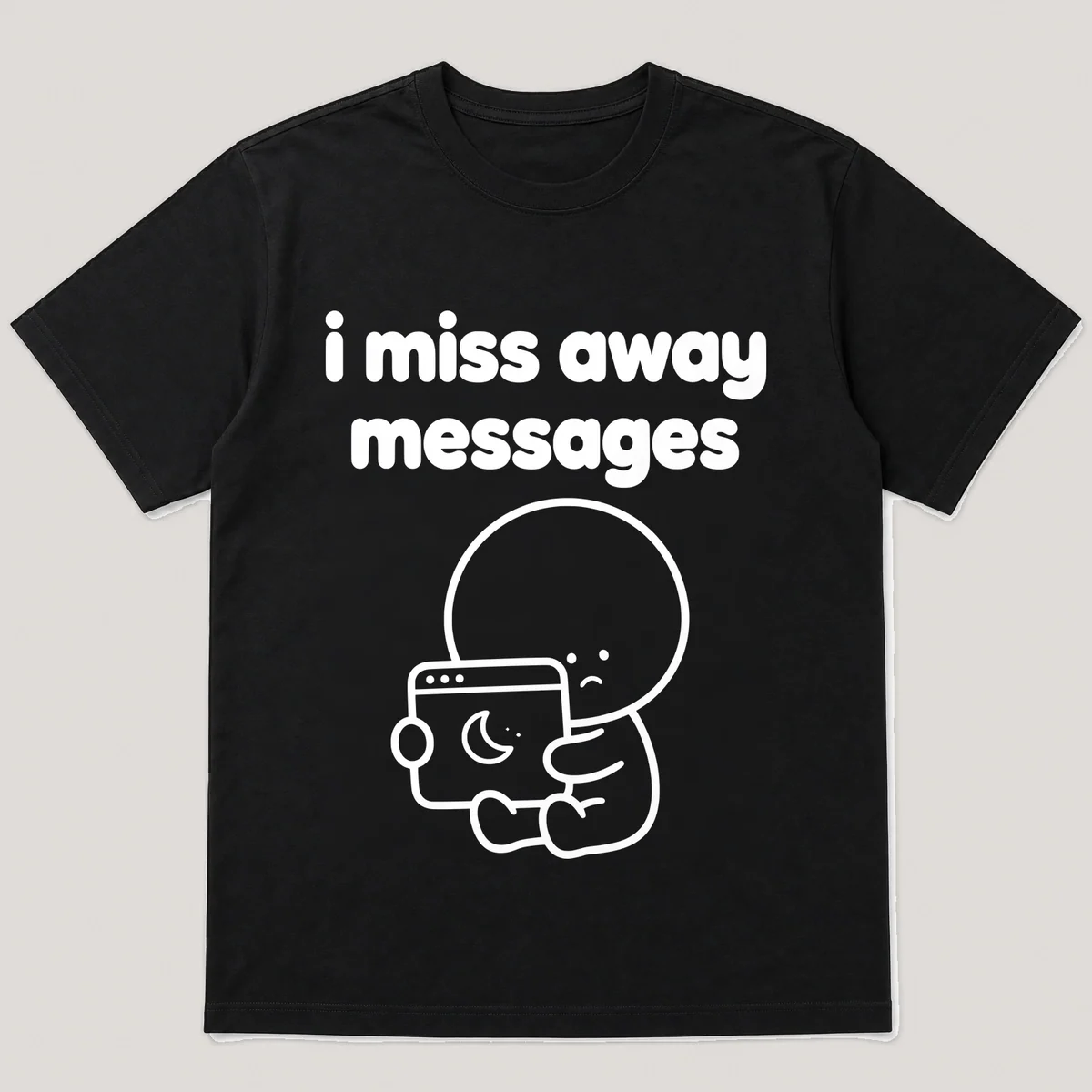 lonely boi tee: a small sad cartoon boy hugging a glowing chat window with a moon, with the words i miss away messages above him, Black front view