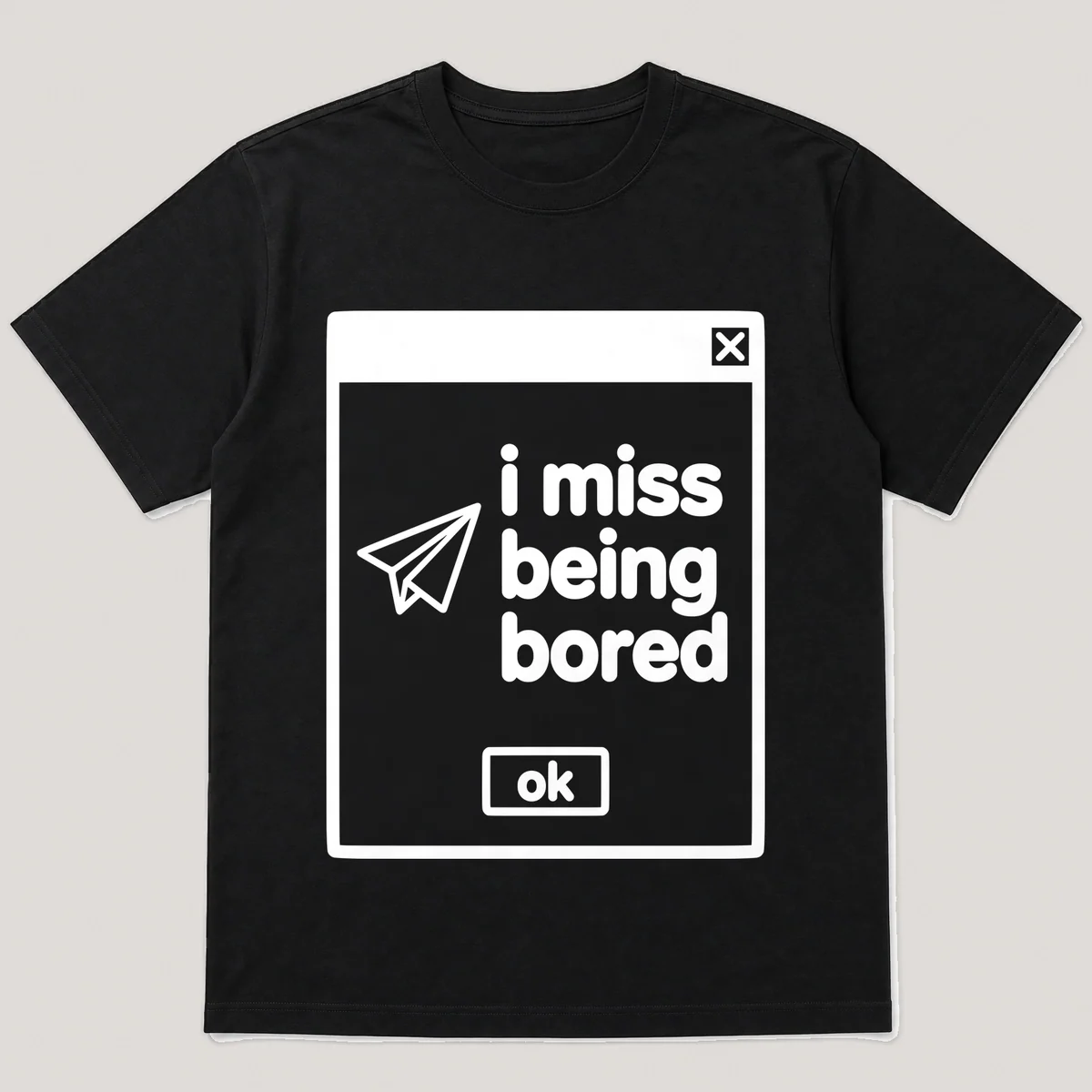 lonely boi tee: a retro computer error dialog window with paper plane and the words i miss being bored and an ok button, Black front view