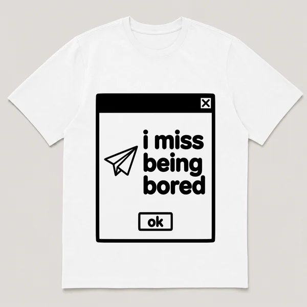 lonely boi tee: a retro computer error dialog window with paper plane and the words i miss being bored and an ok button