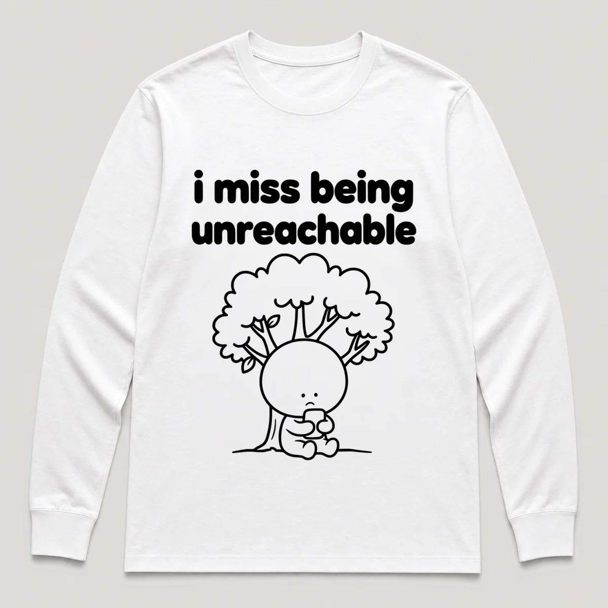 lonely boi tee: a small sad cartoon boy hugging a phone with no signal bars under a tree, with the words i miss being unreachable above him, White front view