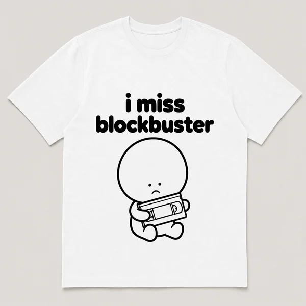 lonely boi tee: a small sad cartoon boy hugging a vhs tape in a rental case, with the words i miss blockbuster above him