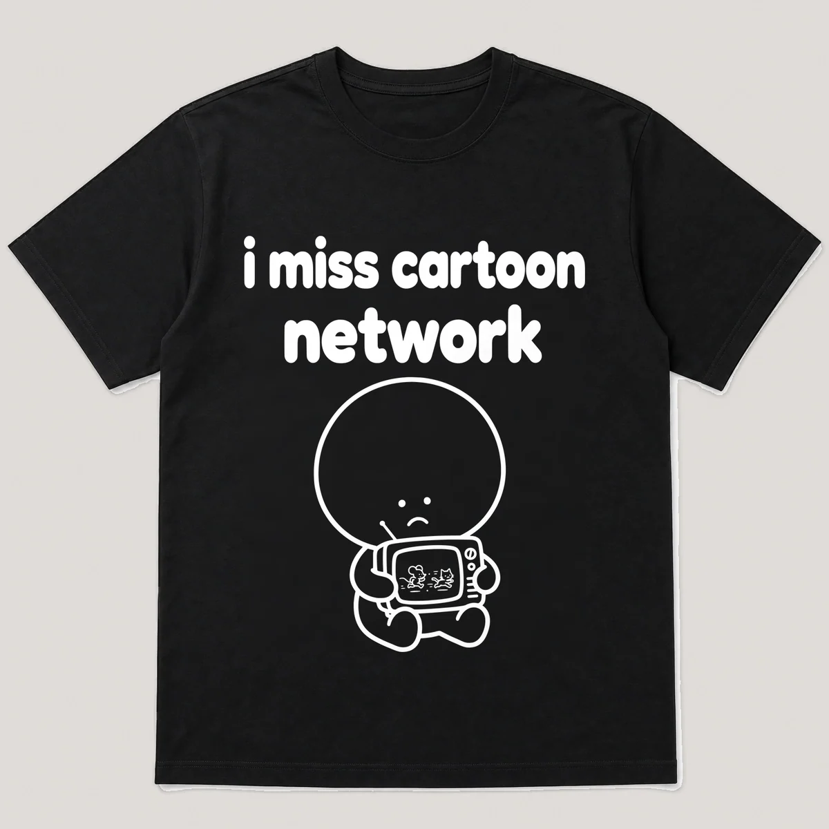 lonely boi tee: a small sad cartoon boy hugging a small tv showing a cartoon chase, with the words i miss cartoon network above him, Black front view