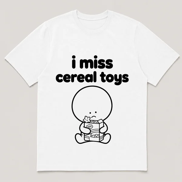 lonely boi tee: a small sad cartoon boy hugging a cereal box with a toy surprise, with the words i miss cereal toys above him