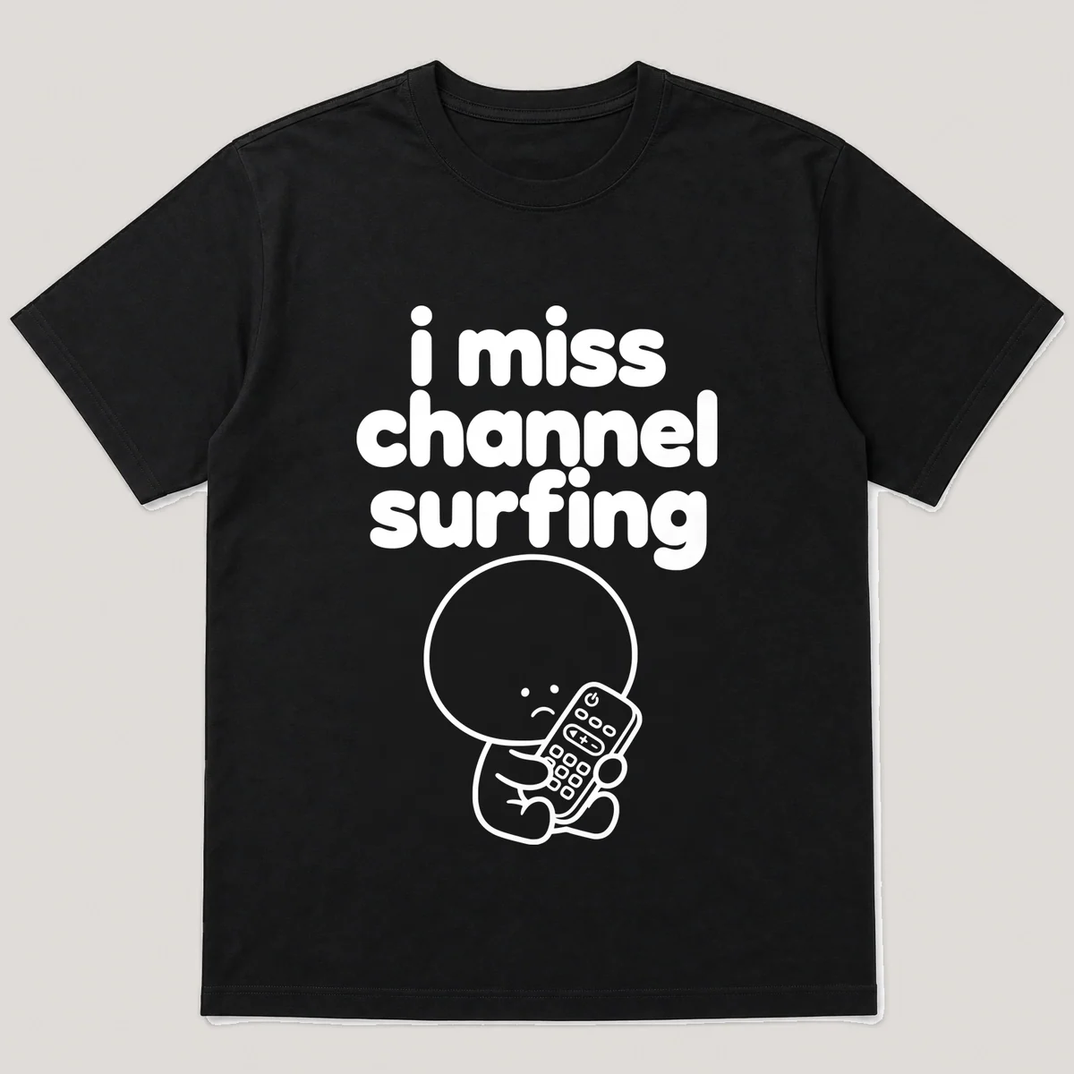 lonely boi tee: a small sad cartoon boy hugging a chunky tv remote control, with the words i miss channel surfing above him, Black front view