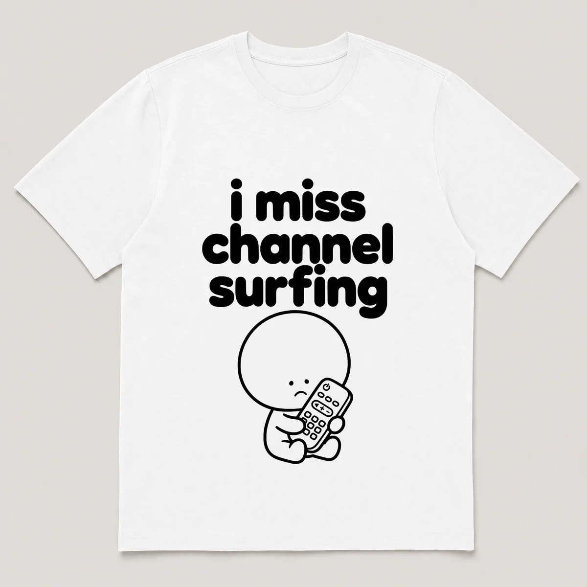 lonely boi tee: a small sad cartoon boy hugging a chunky tv remote control, with the words i miss channel surfing above him, White front view