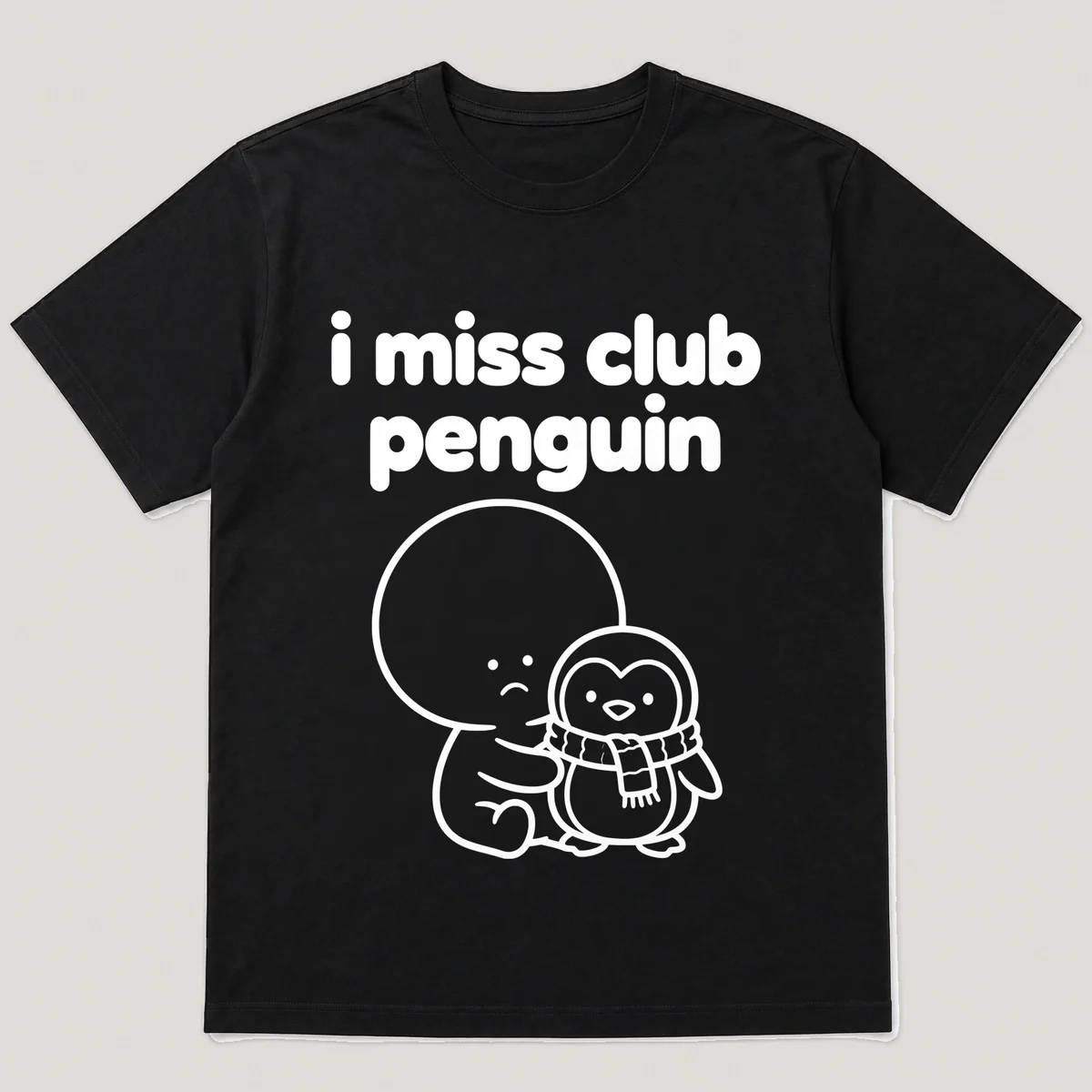 lonely boi tee: a small sad cartoon boy hugging a small cartoon penguin with a scarf, with the words i miss club penguin above him, Black front view