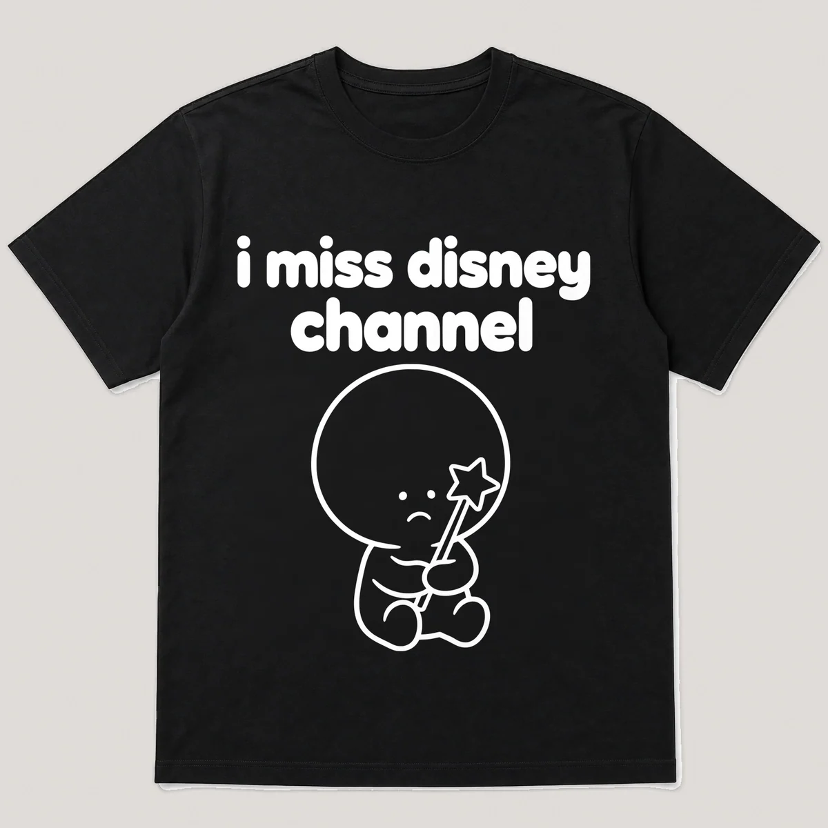 lonely boi tee: a small sad cartoon boy hugging a star-tipped magic wand, with the words i miss disney channel above him, Black front view
