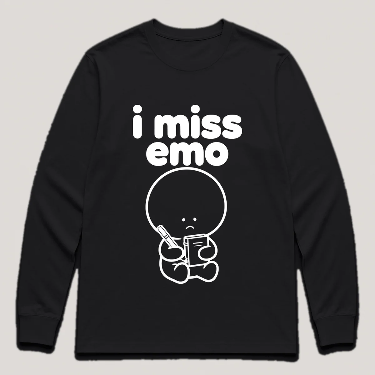 lonely boi tee: a small sad cartoon boy hugging a black eyeliner pencil and a journal, with the words i miss emo above him, Black front view