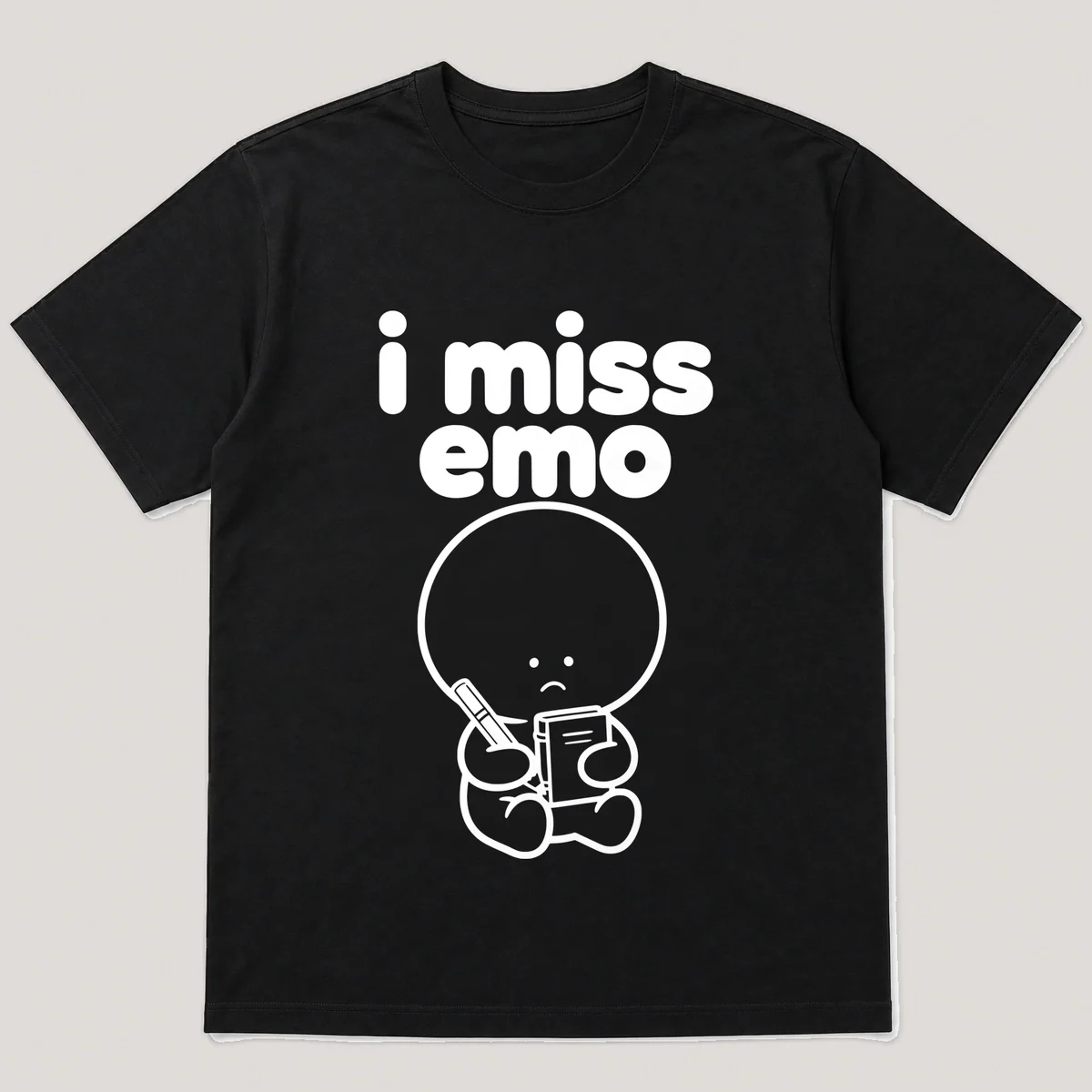 lonely boi tee: a small sad cartoon boy hugging a black eyeliner pencil and a journal, with the words i miss emo above him, Black front view