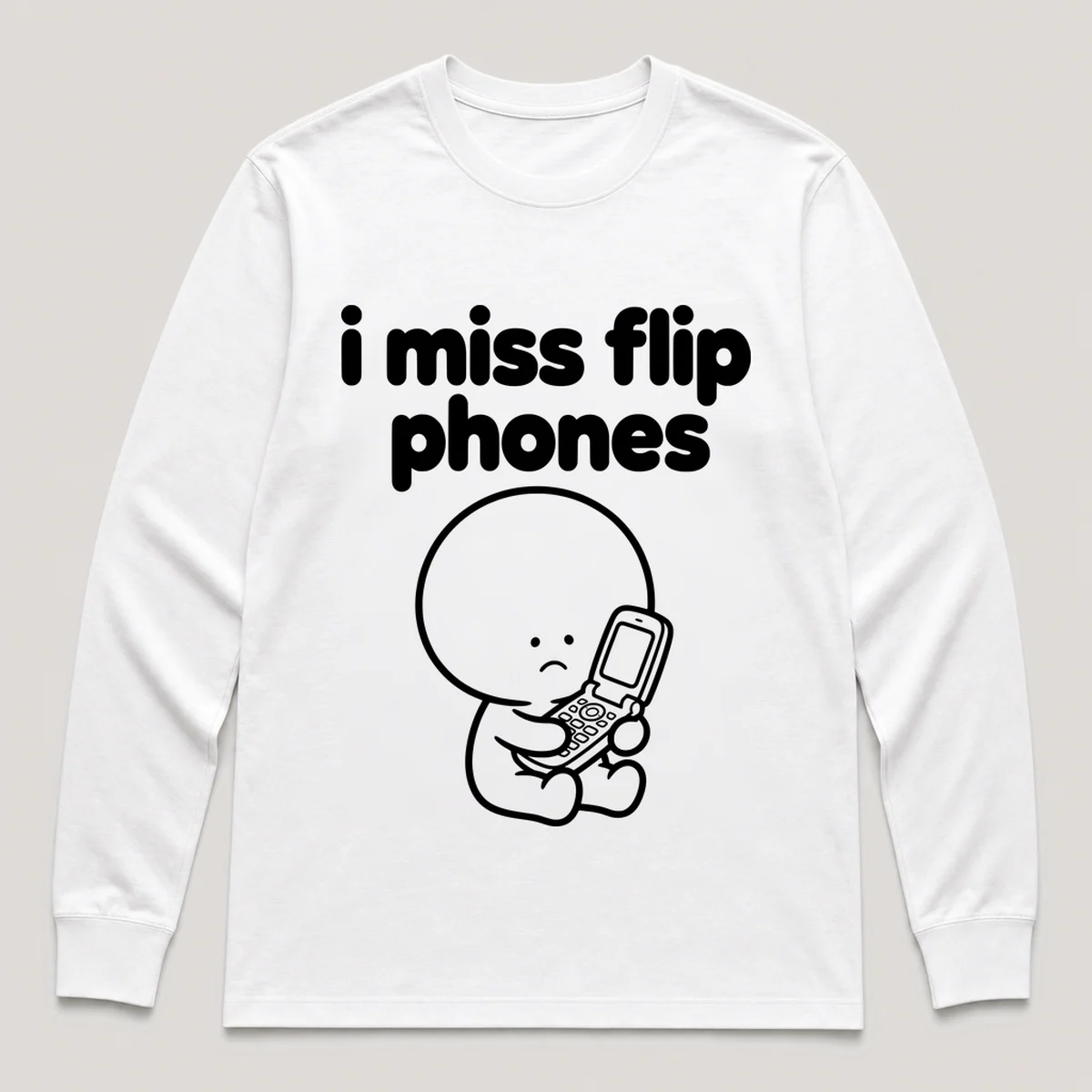 lonely boi tee: a small sad cartoon boy hugging an open flip phone, with the words i miss flip phones above him, White front view