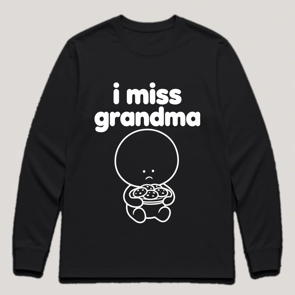 lonely boi tee: a small sad cartoon boy hugging a plate of warm cookies, with the words i miss grandma above him, Black front view