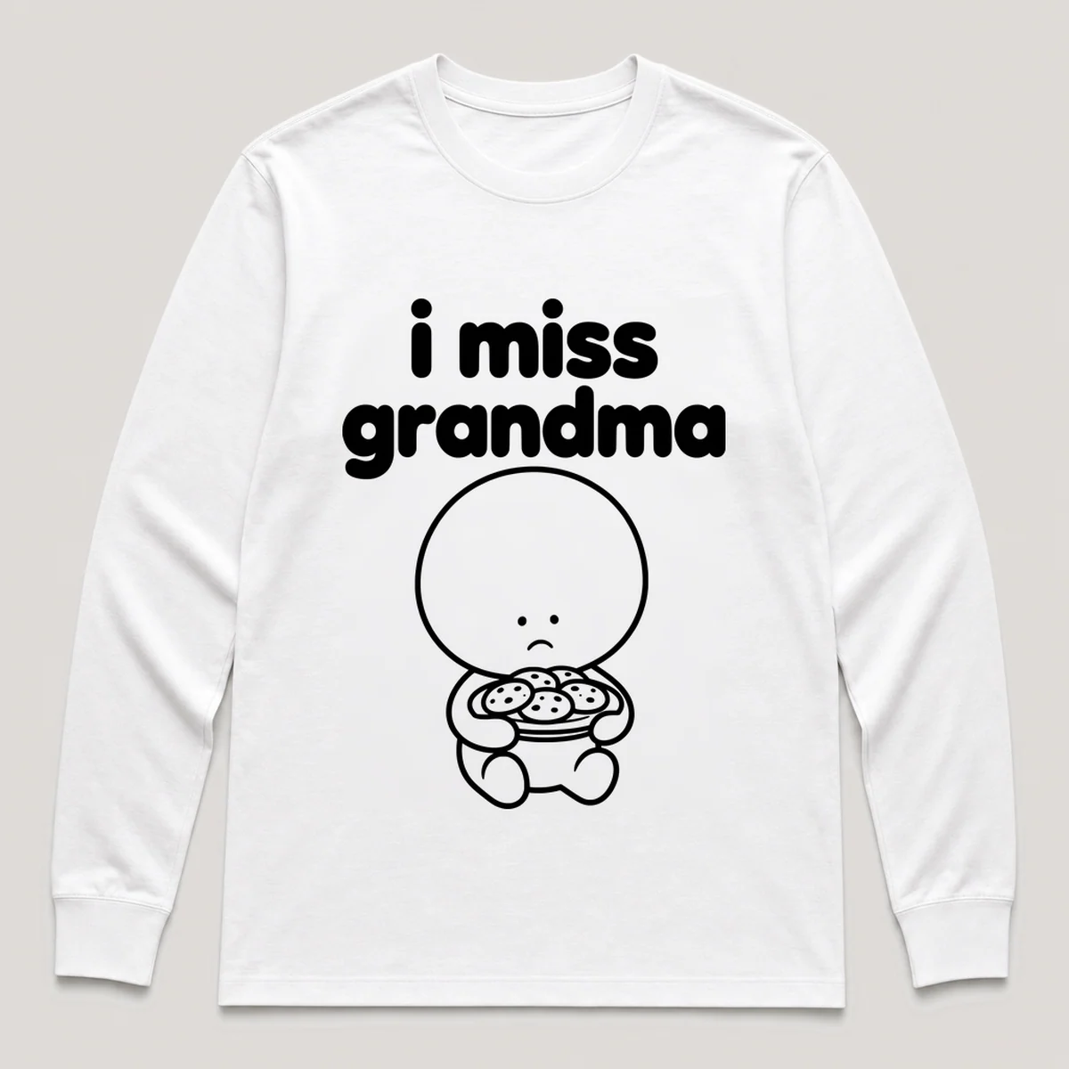 lonely boi tee: a small sad cartoon boy hugging a plate of warm cookies, with the words i miss grandma above him, White front view