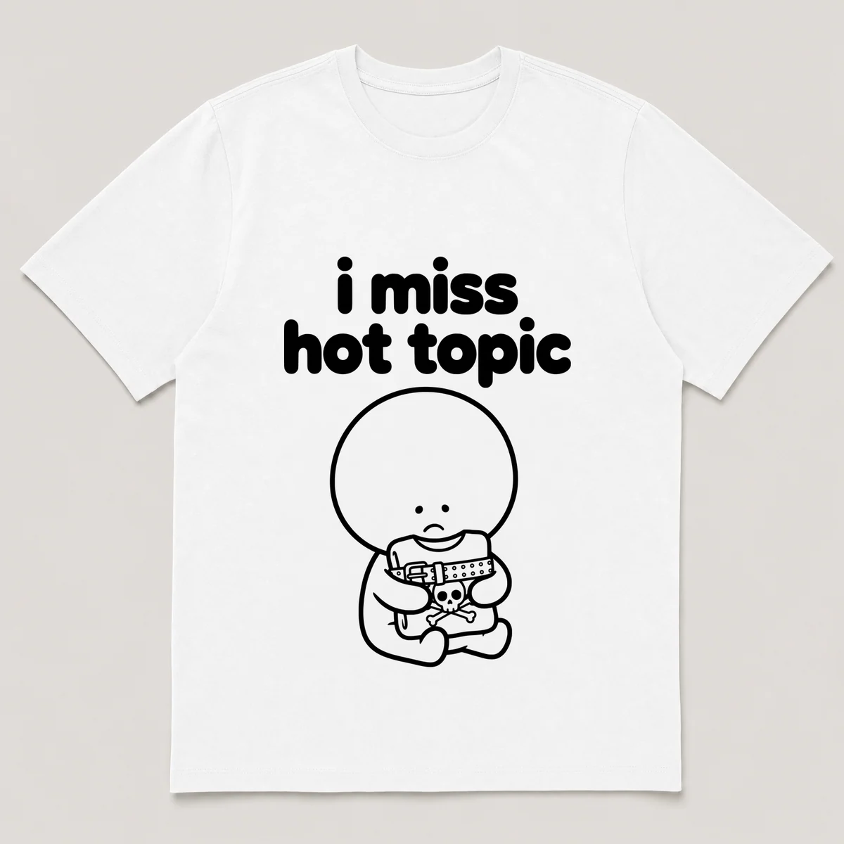 lonely boi tee: a small sad cartoon boy hugging a studded belt and a band tee, with the words i miss hot topic above him, White front view