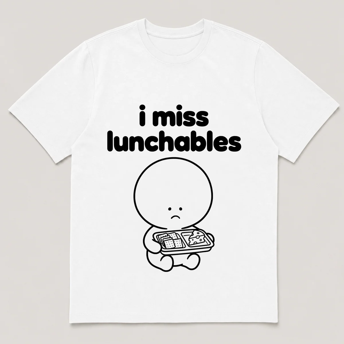 lonely boi tee: a small sad cartoon boy hugging a lunch tray of crackers and cheese, with the words i miss lunchables above him, White front view
