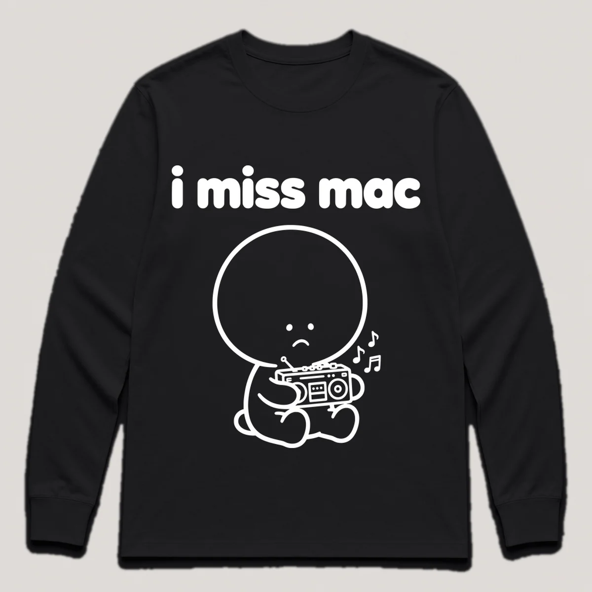 lonely boi tee: a small sad cartoon boy hugging a small boombox with music notes, with the words i miss mac above him, Black front view