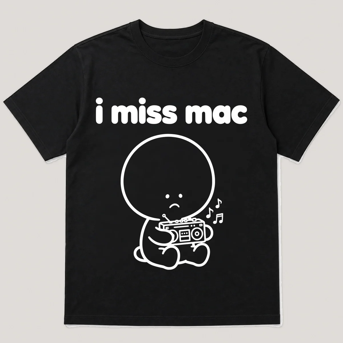 lonely boi tee: a small sad cartoon boy hugging a small boombox with music notes, with the words i miss mac above him, Black front view