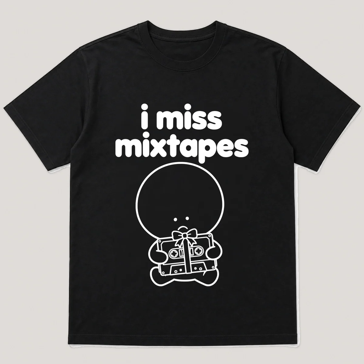 lonely boi tee: a small sad cartoon boy hugging a cassette tape wrapped with a bow, with the words i miss mixtapes above him, Black front view