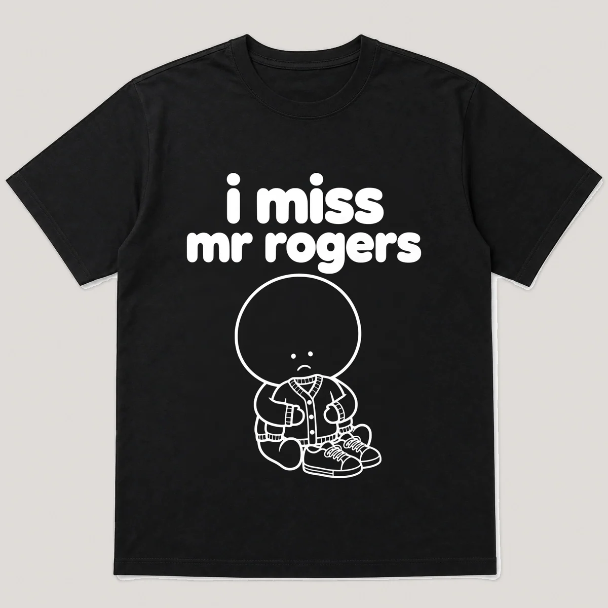 lonely boi tee: a small sad cartoon boy hugging a red cardigan sweater and sneakers, with the words i miss mr rogers above him, Black front view