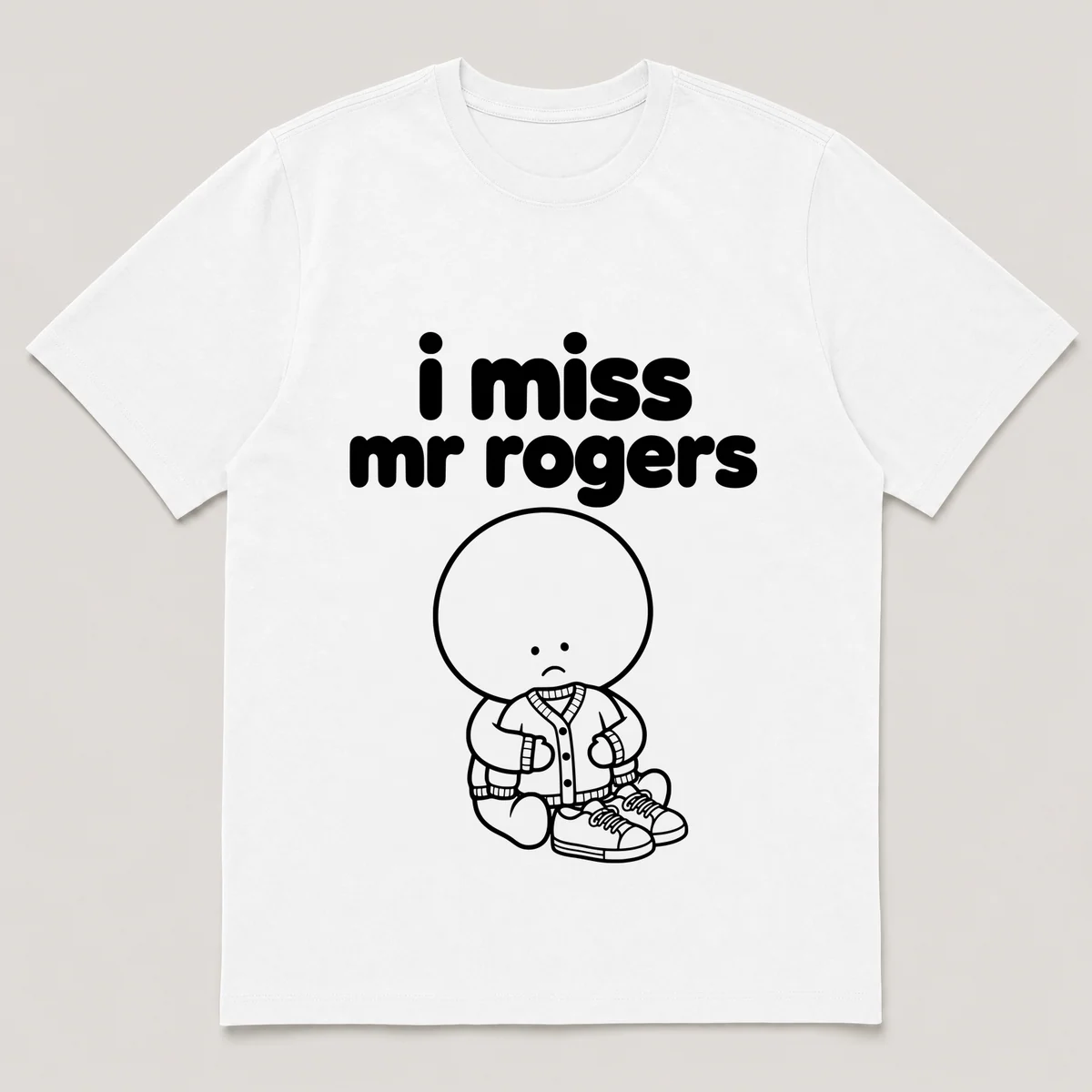 lonely boi tee: a small sad cartoon boy hugging a red cardigan sweater and sneakers, with the words i miss mr rogers above him, White front view