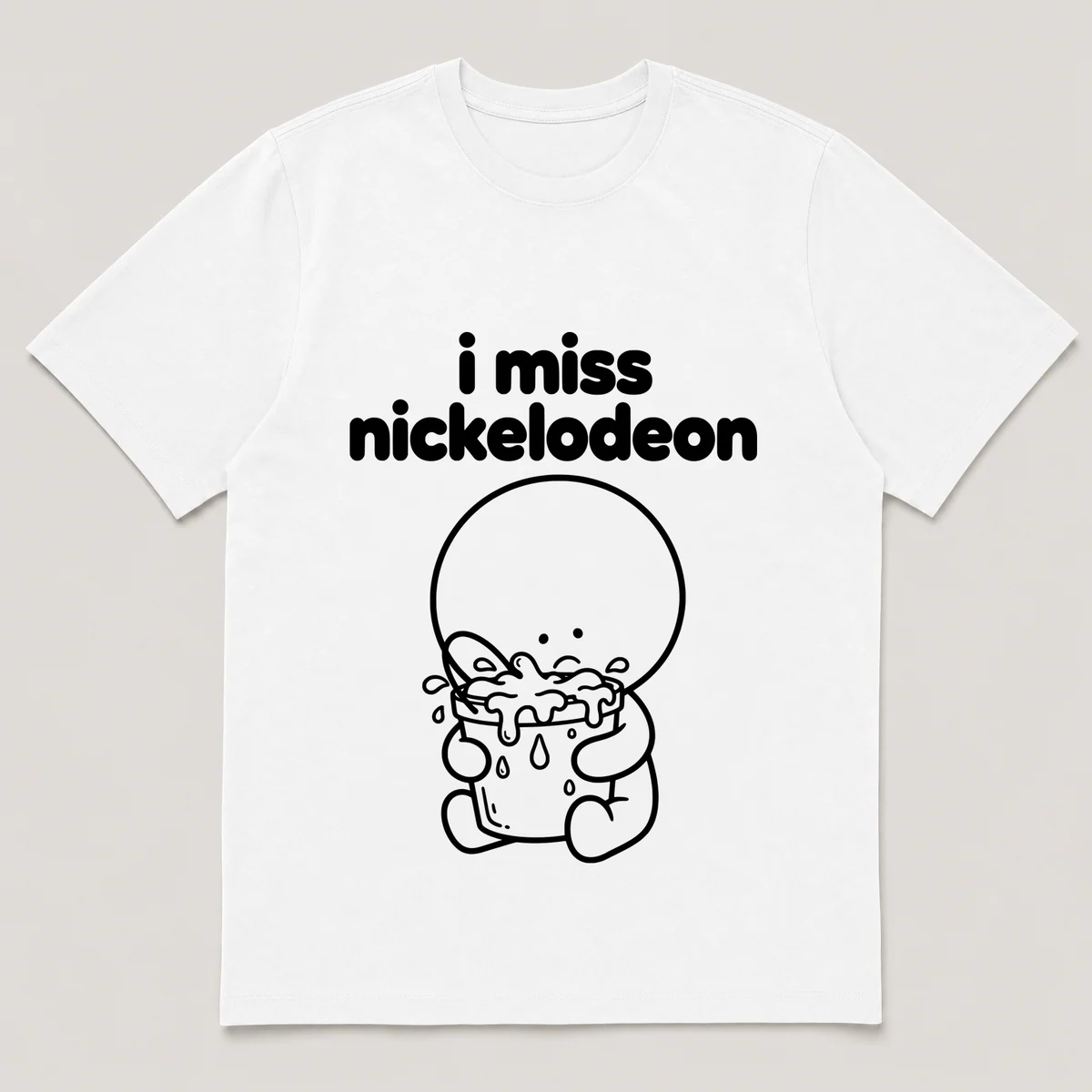 lonely boi tee: a small sad cartoon boy hugging a bucket of green slime, with the words i miss nickelodeon above him, White front view