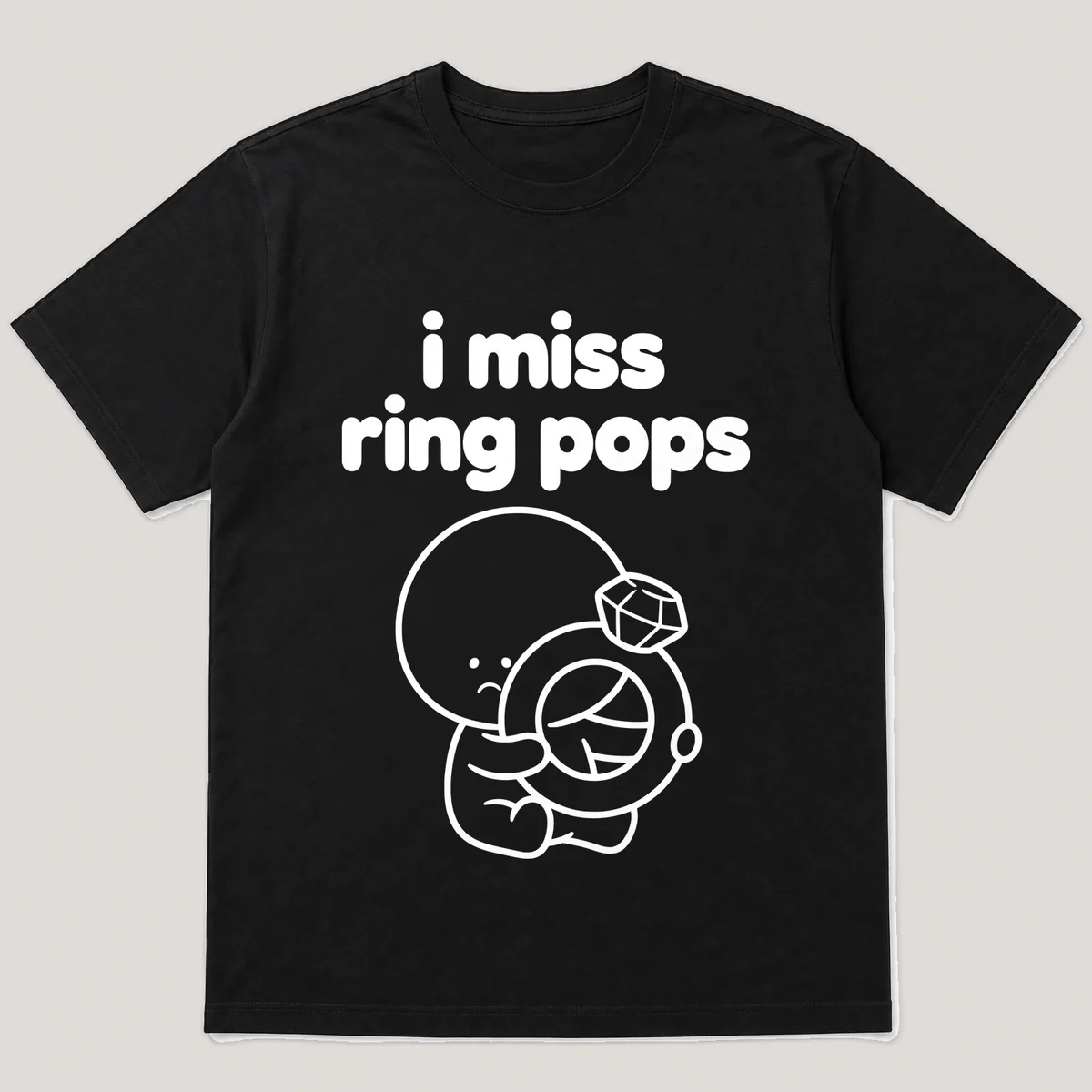 lonely boi tee: a small sad cartoon boy hugging a big jewel candy ring, with the words i miss ring pops above him, Black front view