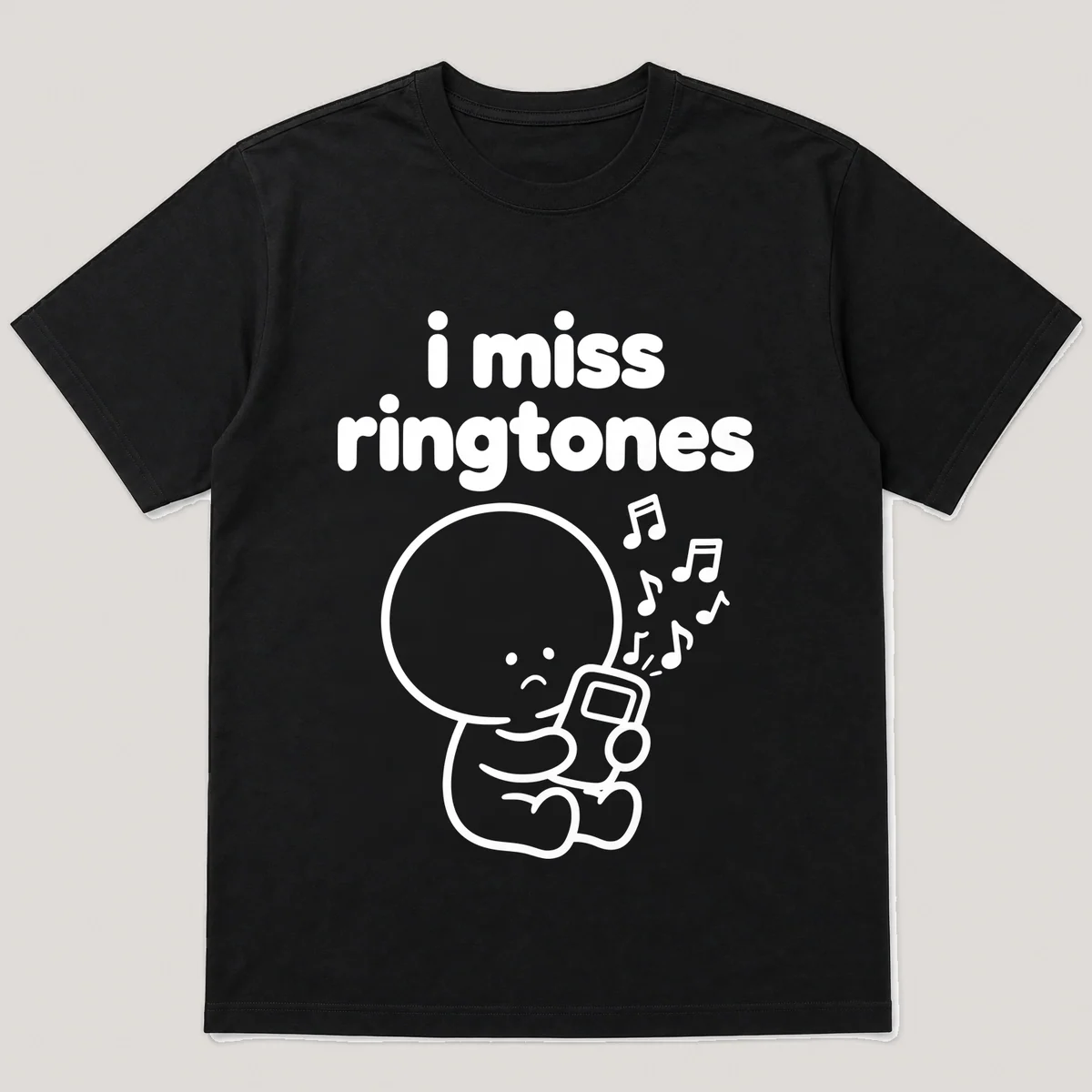 lonely boi tee: a small sad cartoon boy hugging a phone blasting chunky music notes, with the words i miss ringtones above him, Black front view
