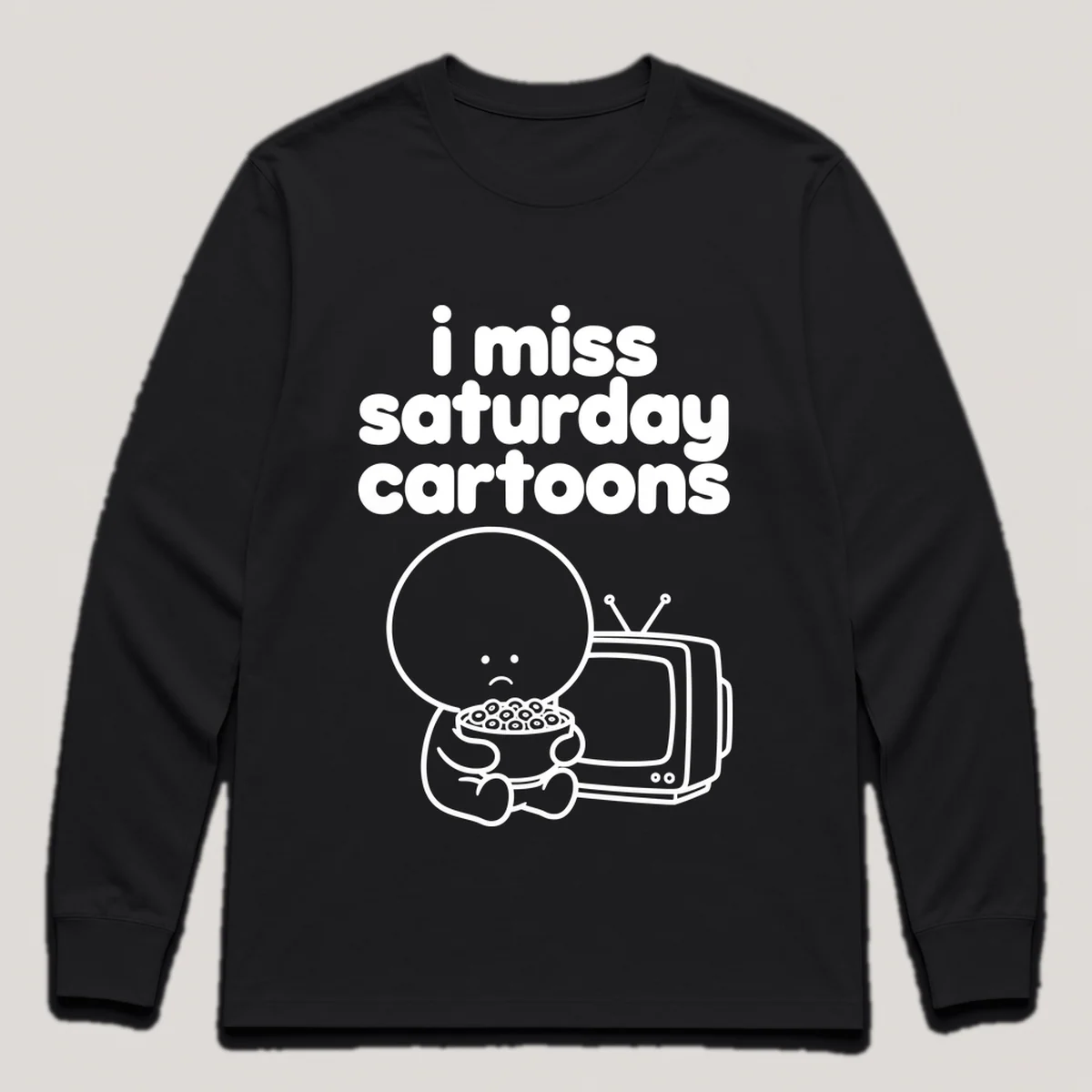 lonely boi tee: a small sad cartoon boy hugging a bowl of cereal in front of a small old crt tv, with the words i miss saturday cartoons above him, Black front view