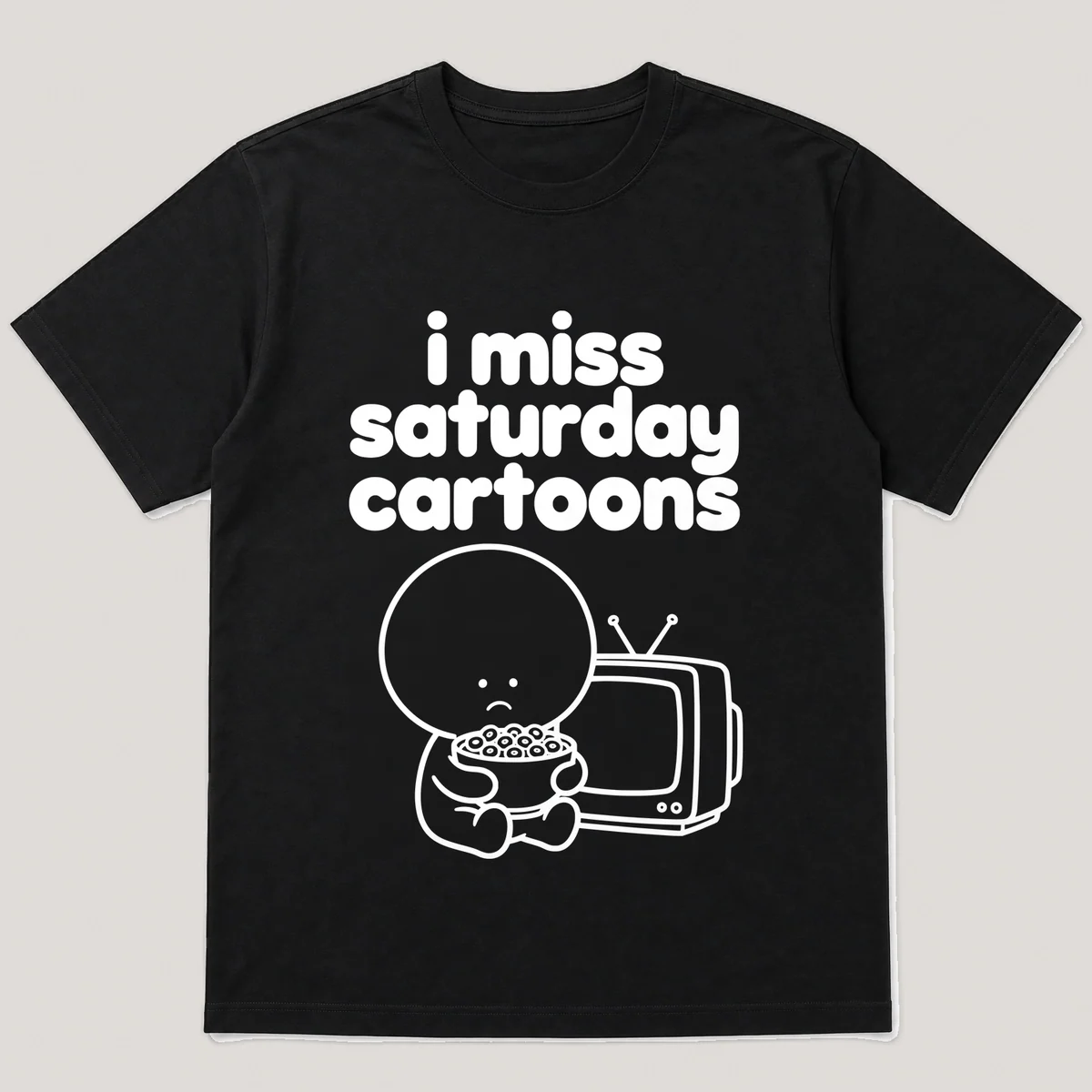 lonely boi tee: a small sad cartoon boy hugging a bowl of cereal in front of a small old crt tv, with the words i miss saturday cartoons above him, Black front view