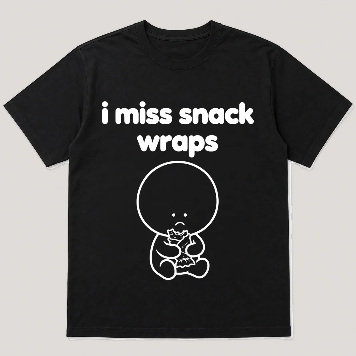 lonely boi tee: a small sad cartoon boy hugging a small crispy wrapped snack, with the words i miss snack wraps above him, Black front view