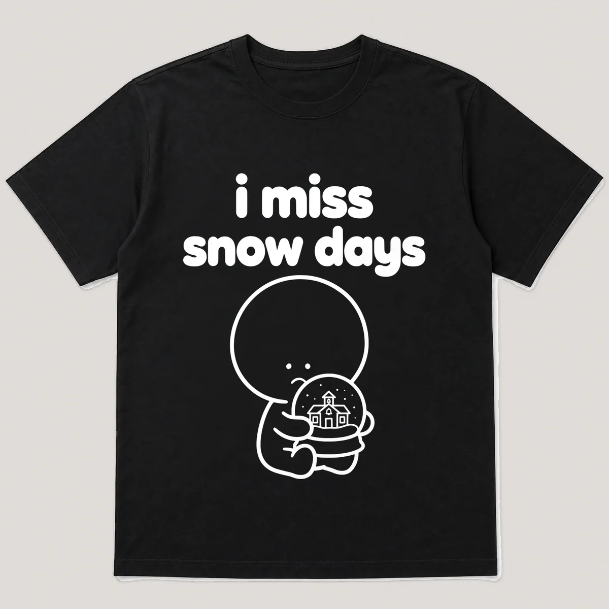 lonely boi tee: a small sad cartoon boy hugging a snow globe with a tiny school, with the words i miss snow days above him, Black front view