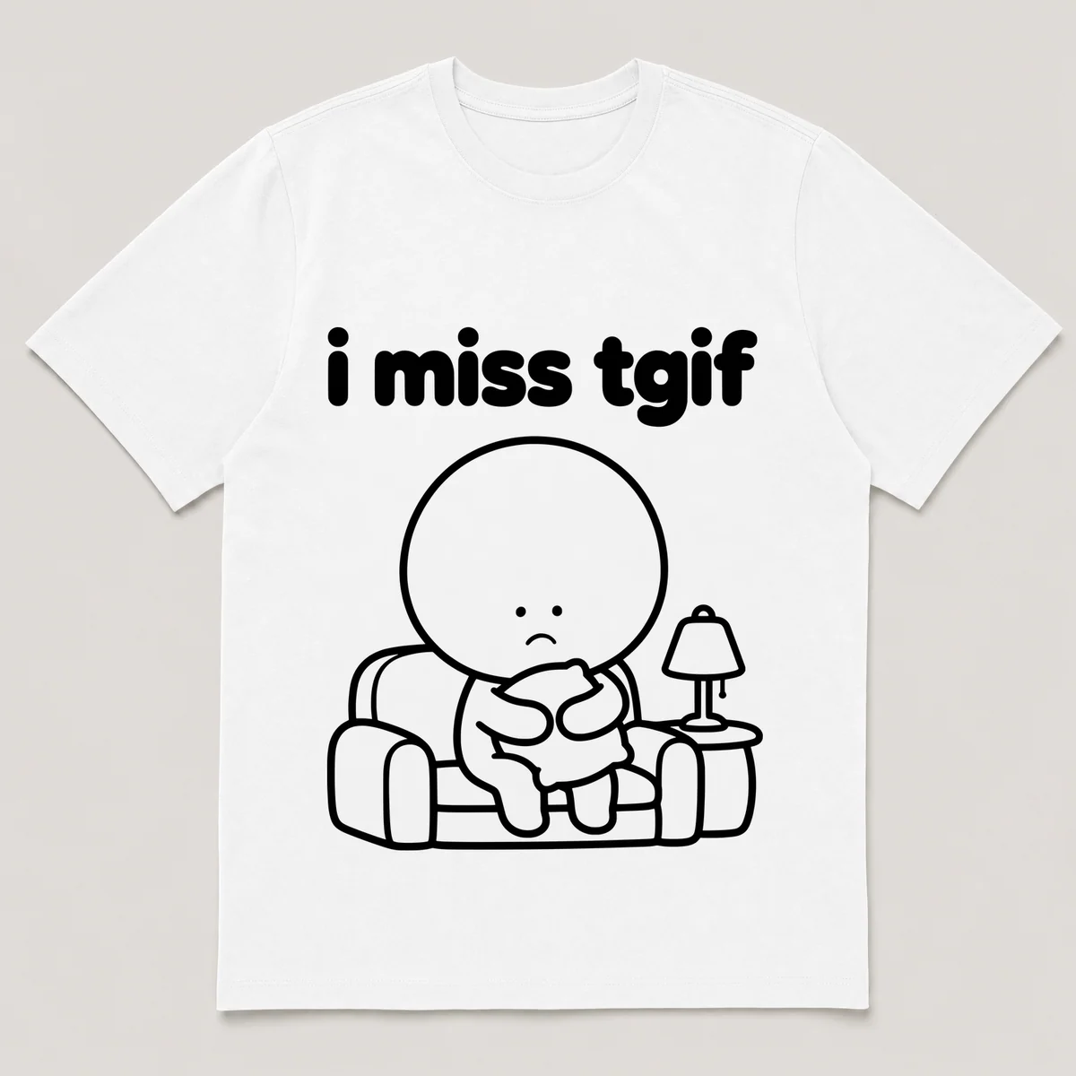 lonely boi tee: a small sad cartoon boy hugging a comfy couch with a warm lamp, with the words i miss tgif above him, White front view