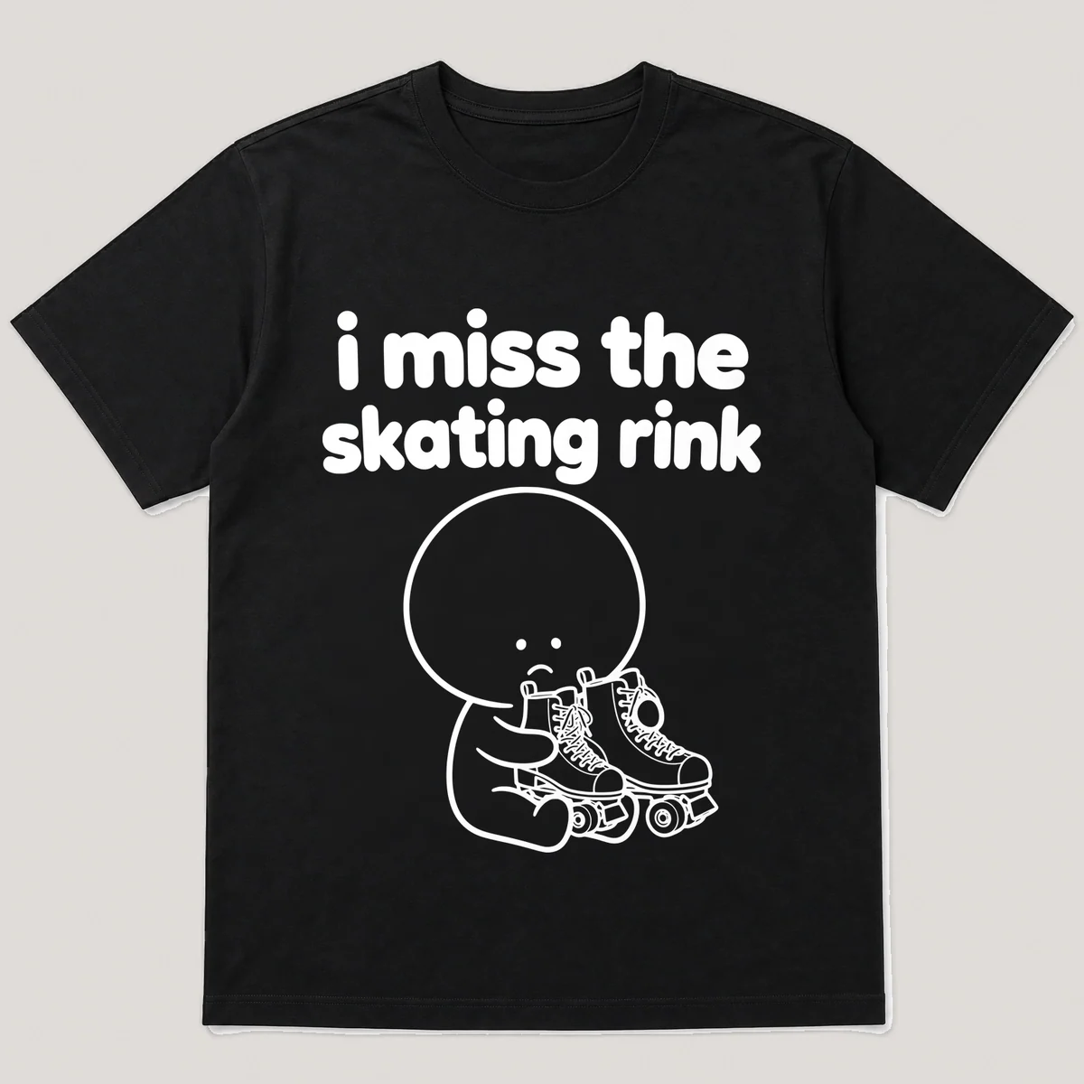 lonely boi tee: a small sad cartoon boy hugging a pair of old quad roller skates, with the words i miss the skating rink above him, Black front view