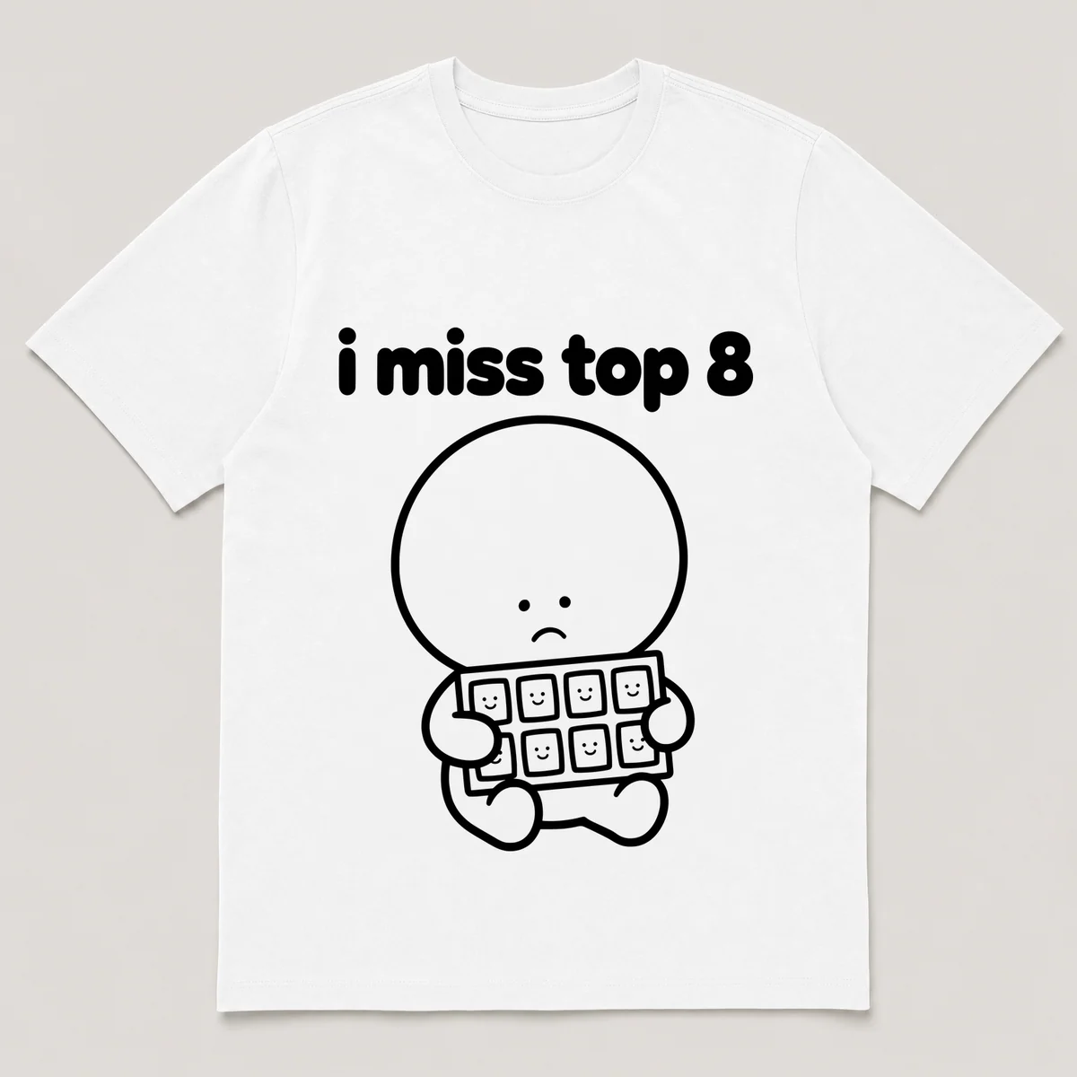 lonely boi tee: a small sad cartoon boy hugging a photo grid of eight small frames, with the words i miss top 8 above him, White front view