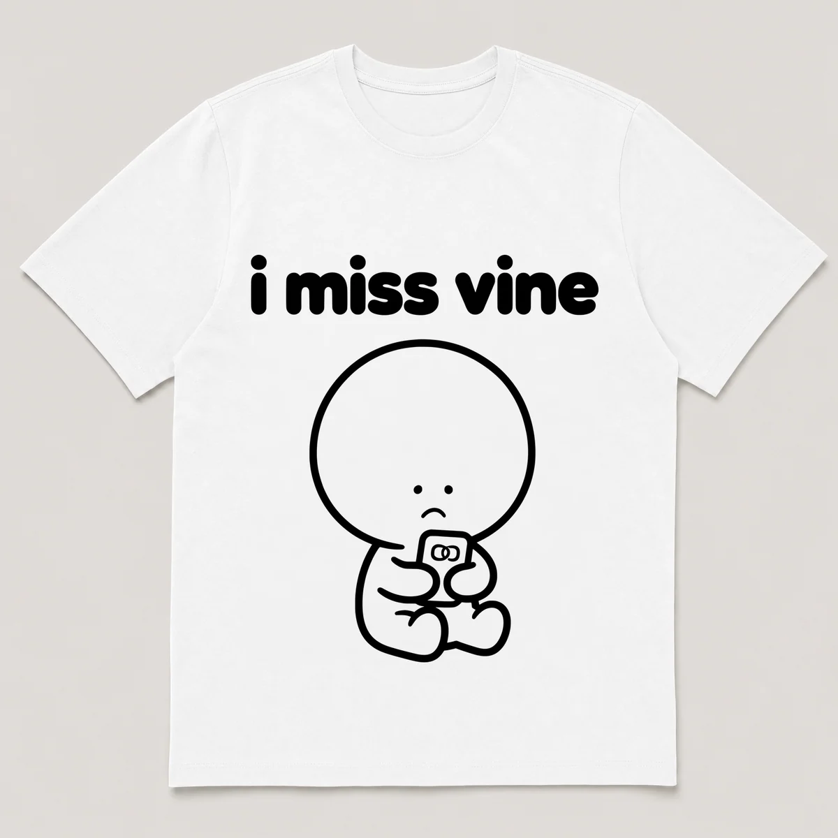 lonely boi tee: a small sad cartoon boy hugging a tiny phone playing a short looping video, with the words i miss vine above him, White front view