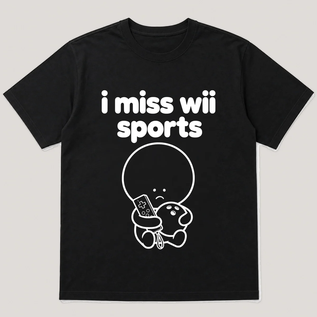 lonely boi tee: a small sad cartoon boy hugging a white motion remote and a bowling ball, with the words i miss wii sports above him, Black front view