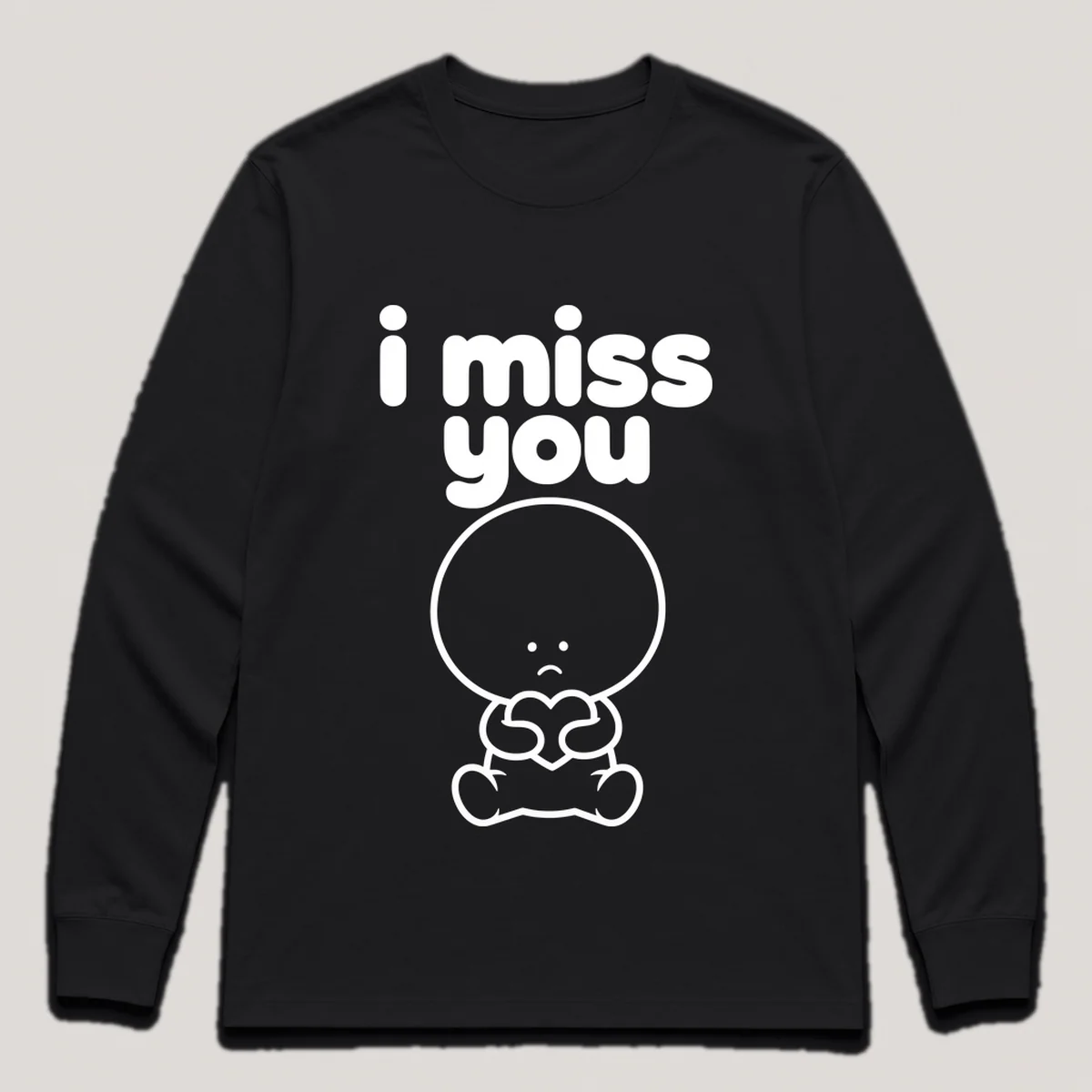lonely boi tee: a small sad cartoon boy hugging a single small heart, with the words i miss you above him, Black front view