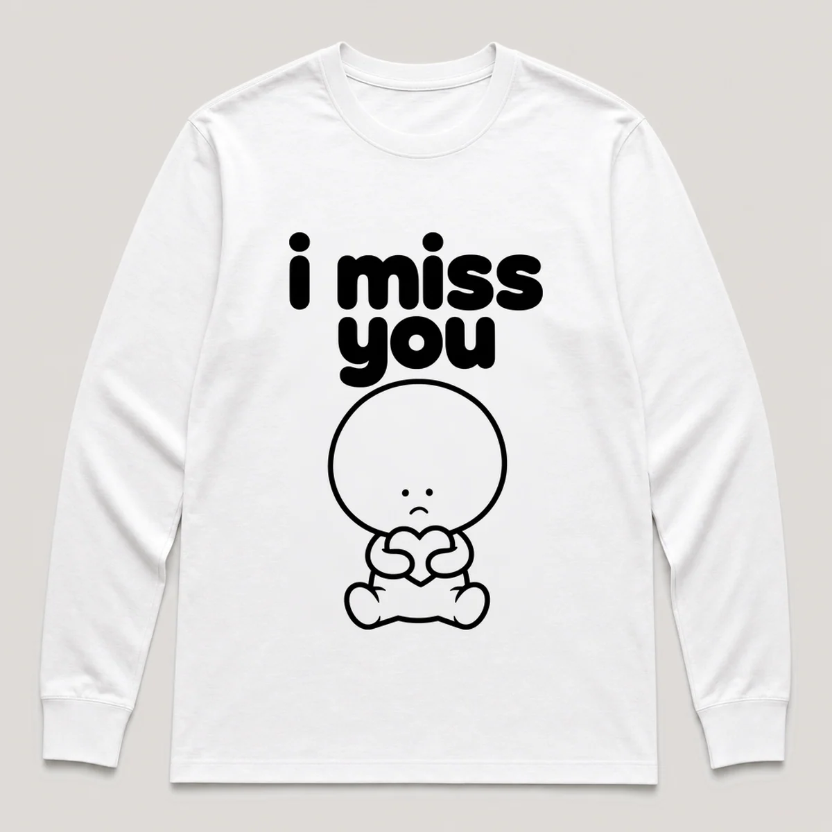 lonely boi tee: a small sad cartoon boy hugging a single small heart, with the words i miss you above him, White front view